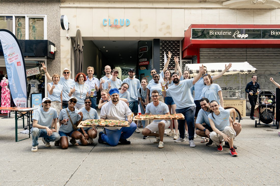 The Cloud Factory team celebrating outside the restaurant